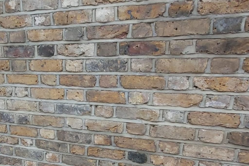 Traditional weather-struck pointing